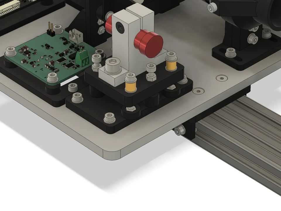 Fusion CAD close-up of the red laser module in its upright holder, with the leveling platform, mounting hardware, and green TX-A board beside it.